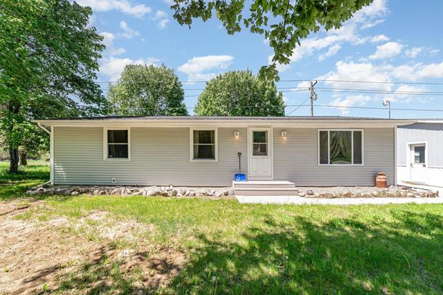 front view picture of 7205 N Gilmore Road, Farwell, MI. 48622