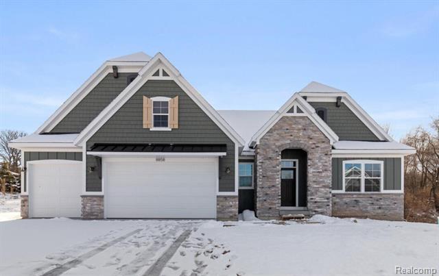 front view picture of 8858 Lapham Drive Ne, Rockford, MI. 49341