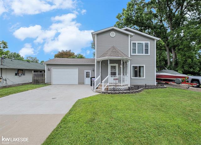 front view picture of 212 Darrow Street, Clio, MI. 48420