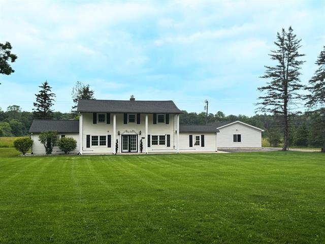 front view picture of 6170 Gregory Road, Dexter, MI. 48130