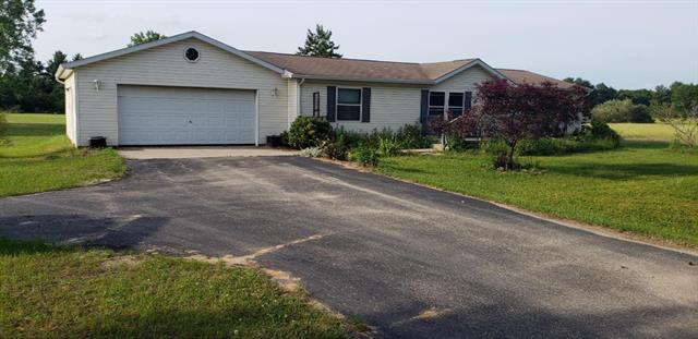 front view picture of 105 Penny Lane, Stanton, MI. 48888