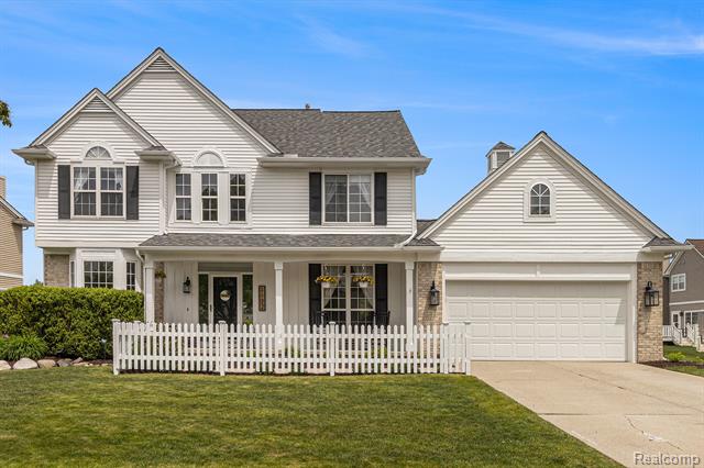 front view picture of 1122 Colt Dr, South Lyon, MI. 48178