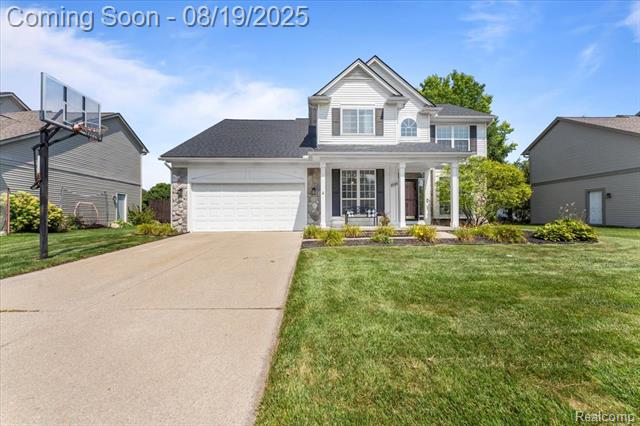front view picture of 1098 Colt Dr, South Lyon, MI. 48178