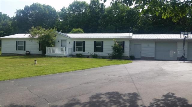 front view picture of 12700 Pennington Avenue Ne, Sparta, MI. 49345