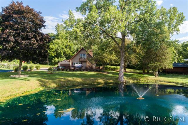 front view picture of 12666 Grand River Drive Se, Lowell, MI. 49331