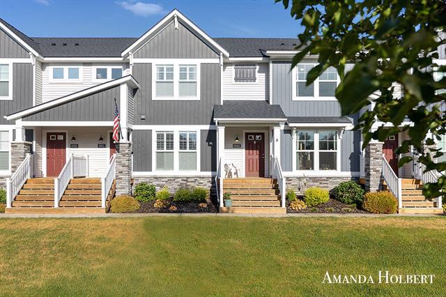 front view picture of 6963 Myers Lake Avenue Ne, Rockford, MI. 49341