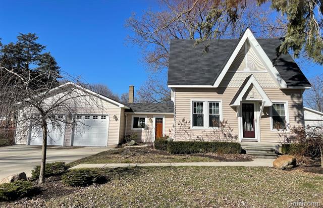 front view picture of 30061 Cherry Ln, New Hudson, MI. 48165