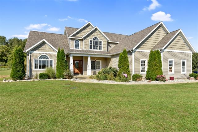 front view picture of 4362 S Vickeryville Road, Sheridan, MI. 48884