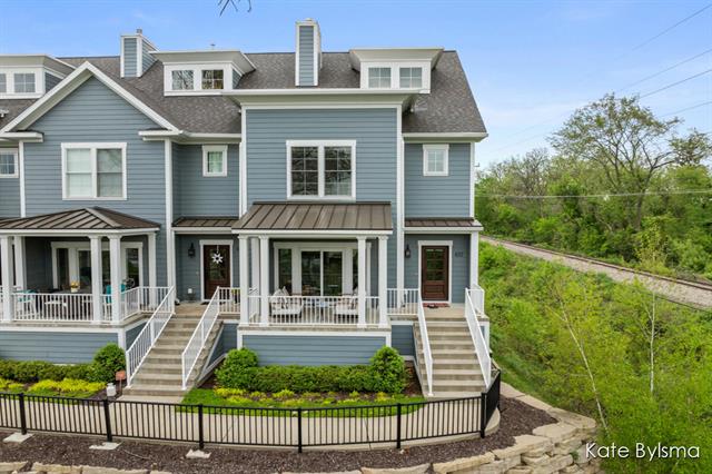 front view picture of 657 Greenslate Drive Se, Ada, MI. 49301