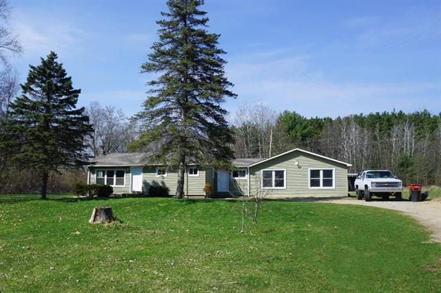 front view picture of 12965 17 Mile Road Ne, Gowen, MI. 49326