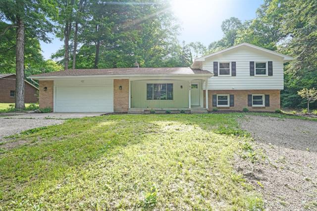 front view picture of 11672 Long Lake Drive Nw, Sparta, MI. 49345