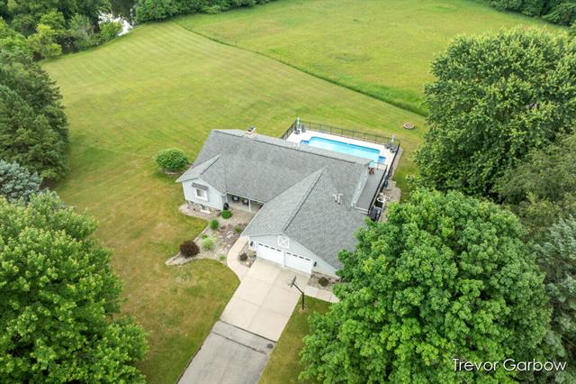 front view picture of 6770 Rivers Edge Lane, Middleville, MI. 49333