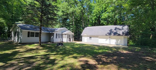 front view picture of 878 N Wolf Ave, Baldwin, MI. 49304