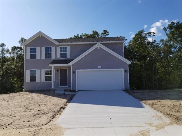 front view picture of 10644 Woodbushe Drive Drive Se, Lowell, MI. 49331