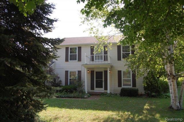 front view picture of 29280 Roediger Ct, New Hudson, MI. 48165