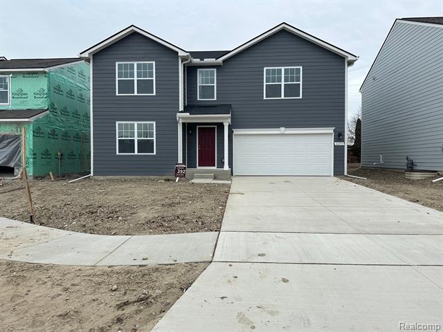 front view picture of 32250 Bradford Street, New Haven, MI. 48048