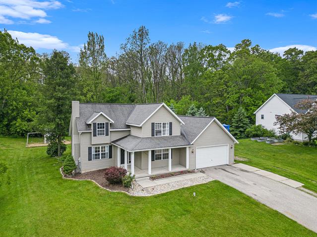front view picture of 13860 Rolling Creek Drive, Lowell, MI. 49331
