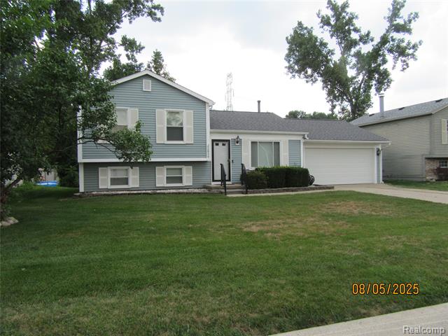 front view picture of 2850 Apache Trl, Wixom, MI. 48393