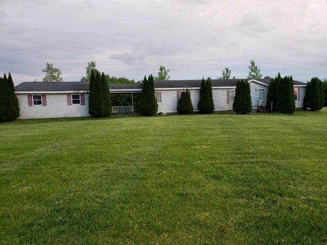 front view picture of 778 Mckinch Drive, Saranac, MI. 48881