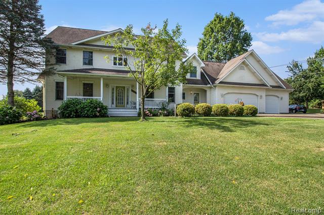 front view picture of 8472 Maltby Road, Brighton, MI. 48116