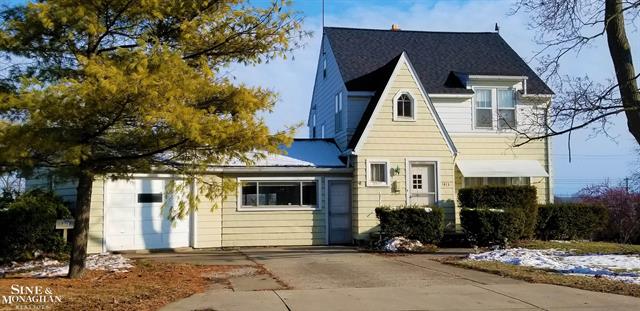 front view picture of 1413 S Riverside Ave, Saint Clair, MI. 48079