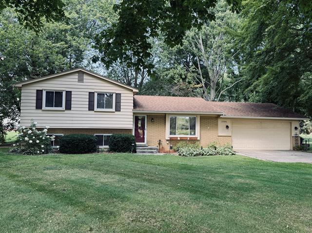 front view picture of 3584 W Maple Rd, Wixom, MI. 48393