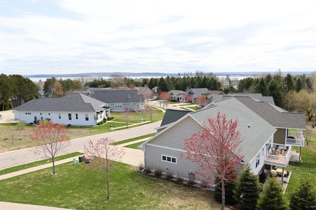 front view picture of 10889 Pine Bluff Drive, Traverse City, MI. 49684