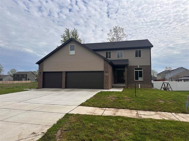 front view picture of 30242 Weathervane Woods Drive, New Haven, MI. 48048