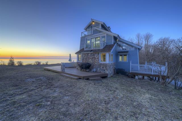 front view picture of 4781 Golfview Drive, Leland, MI. 49654