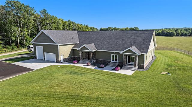 front view picture of 5859 Potter Road, Bear Lake, MI. 49614