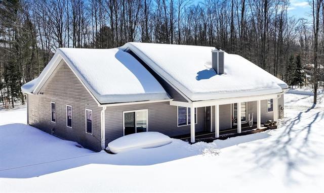 front view picture of 18844 Dans Place, Lake Ann, MI. 49650