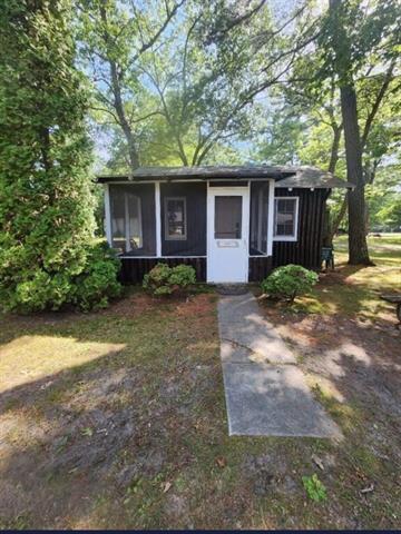 front view picture of 973 N Huron Street, East Tawas, MI. 48730