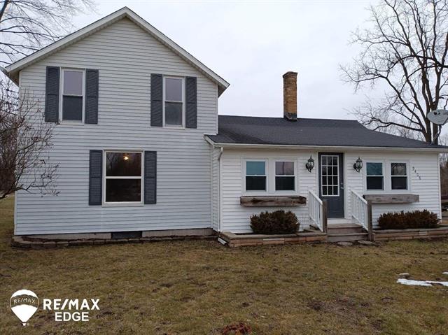 front view picture of 9408 Mcafee Rd, Montrose, MI. 48457