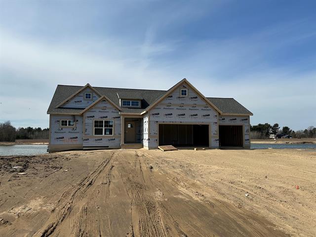 front view picture of 9439 Shoreway Drive, West Olive, MI. 49460