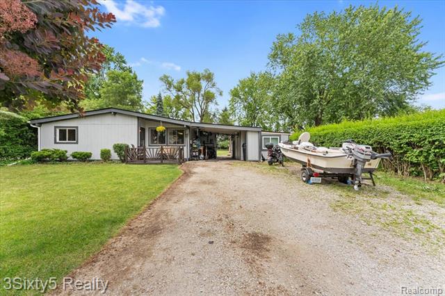 front view picture of 234 Spring Park, Walled Lake, MI. 48390