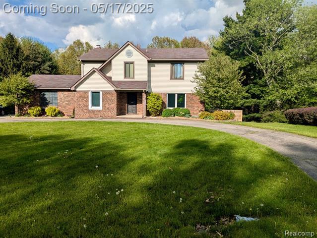 front view picture of 1608 Hartland Woods Drive, Howell, MI. 48843