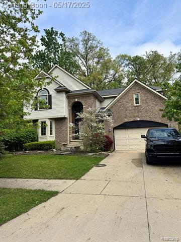 front view picture of 1418 Trailside Blvd, Wixom, MI. 48393