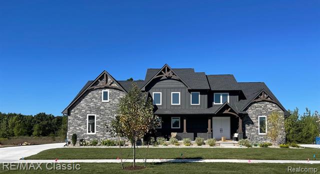 front view picture of 1039 Troon, Highland, MI. 48357