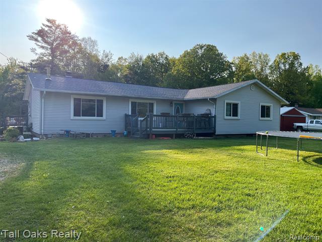front view picture of 13620 East Road, Montrose, MI. 48457