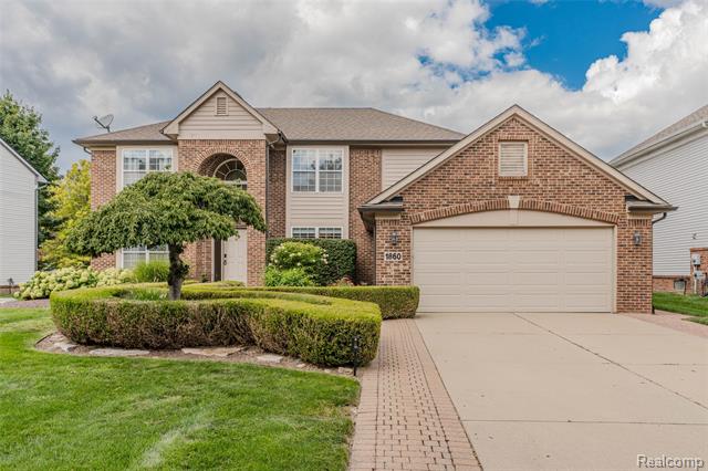 front view picture of 1860 Twin Sun Cir, Walled Lake, MI. 48390