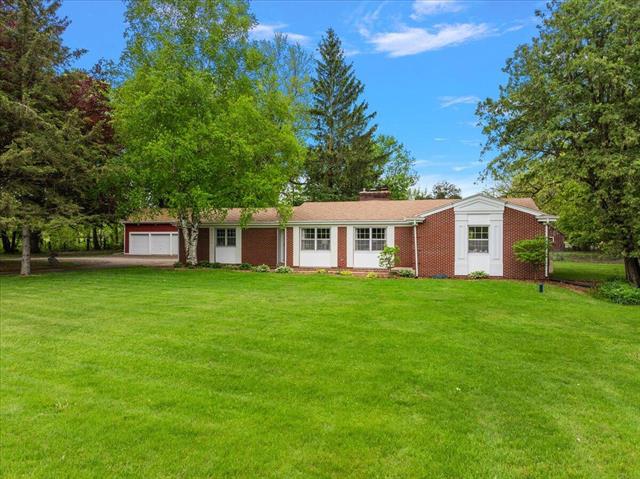 front view picture of 7630 Belding Road Ne, Rockford, MI. 49341