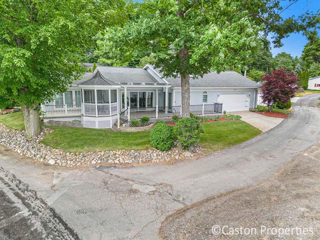 front view picture of 6986 Wildwood Drive, Saranac, MI. 48881