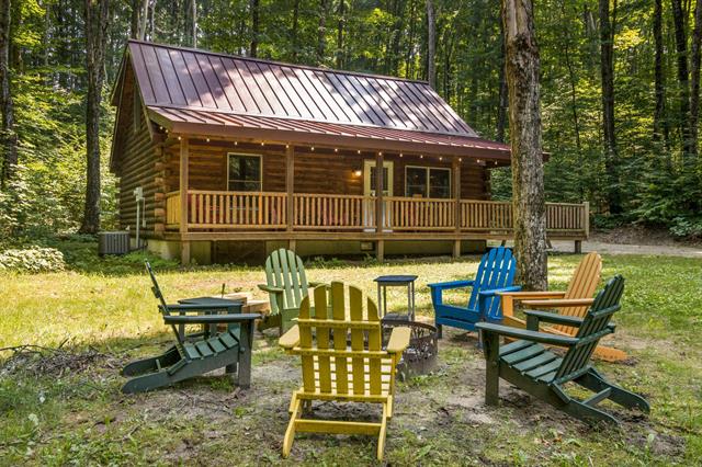 front view picture of 5845 West Village Drive, Bellaire, MI. 49615