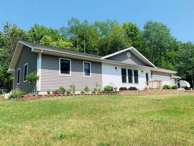 front view picture of 11366 Orchard Drive, Rapid City, MI. 49676