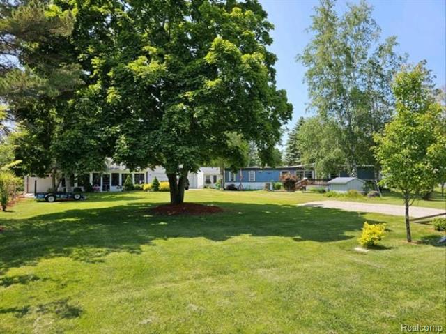 front view picture of 7365 Lighthouse Road, Port Hope, MI. 48468