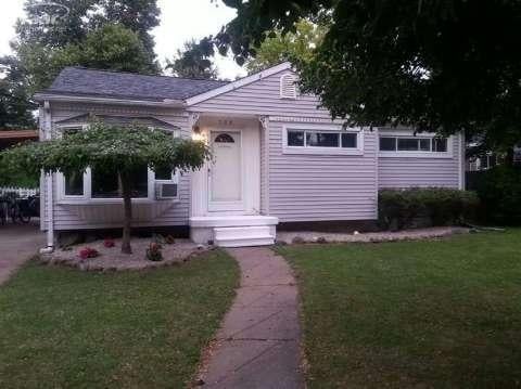 front view picture of 708 Elmwood Drive, Fenton, MI. 48430