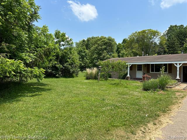 front view picture of 135 Searls S, Webberville, MI. 48892