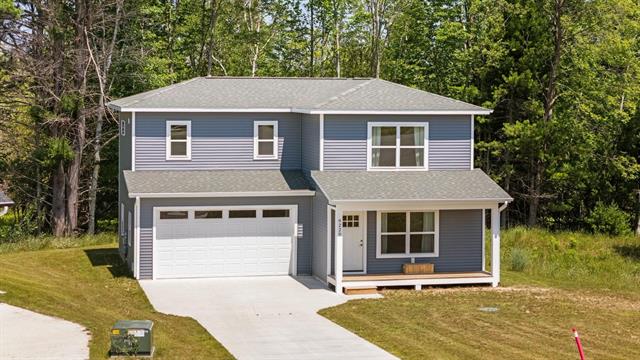 front view picture of 9220 S Flaska Drive, Cedar, MI. 49621