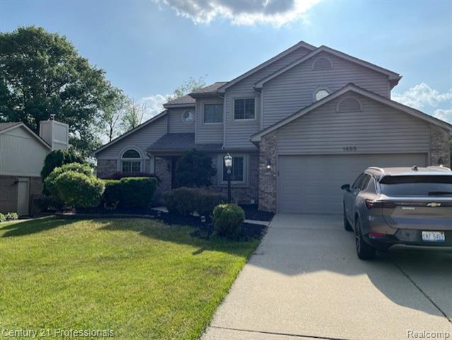 front view picture of 1855 Willowicke Dr, Wixom, MI. 48393