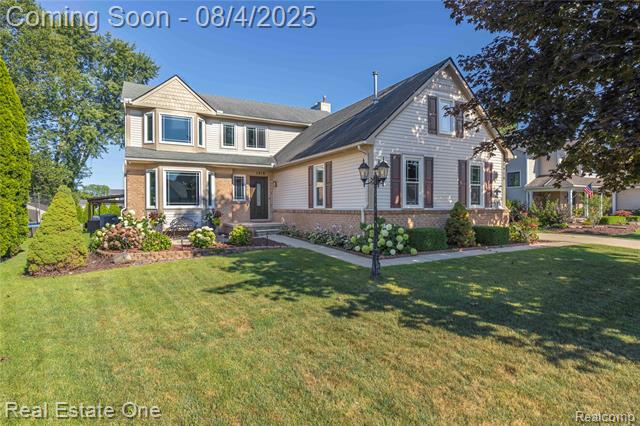 front view picture of 1918 Palmer Dr, Wixom, MI. 48393